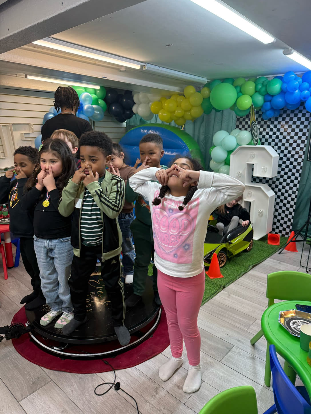 Silly faces on the 360 booth at a kids birthday party